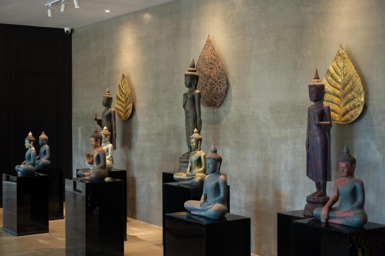 Eightfold Urban Resort سيام ريب المظهر الخارجي الصورة A collection of Thai and Laotian art